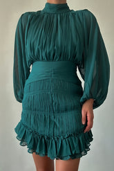 Mini-robe en mousseline à volants